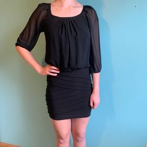Black short dress with mesh sleeves